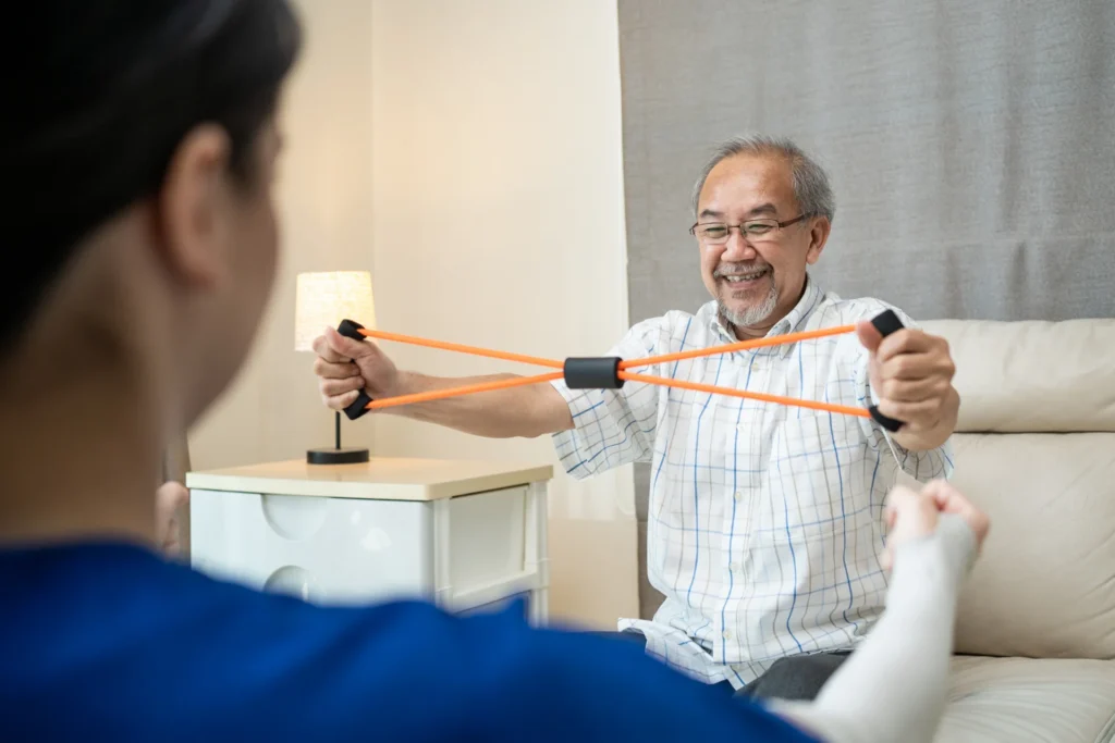senior man exercises with resistance band at home 2026 03 24 22 43 56 utc